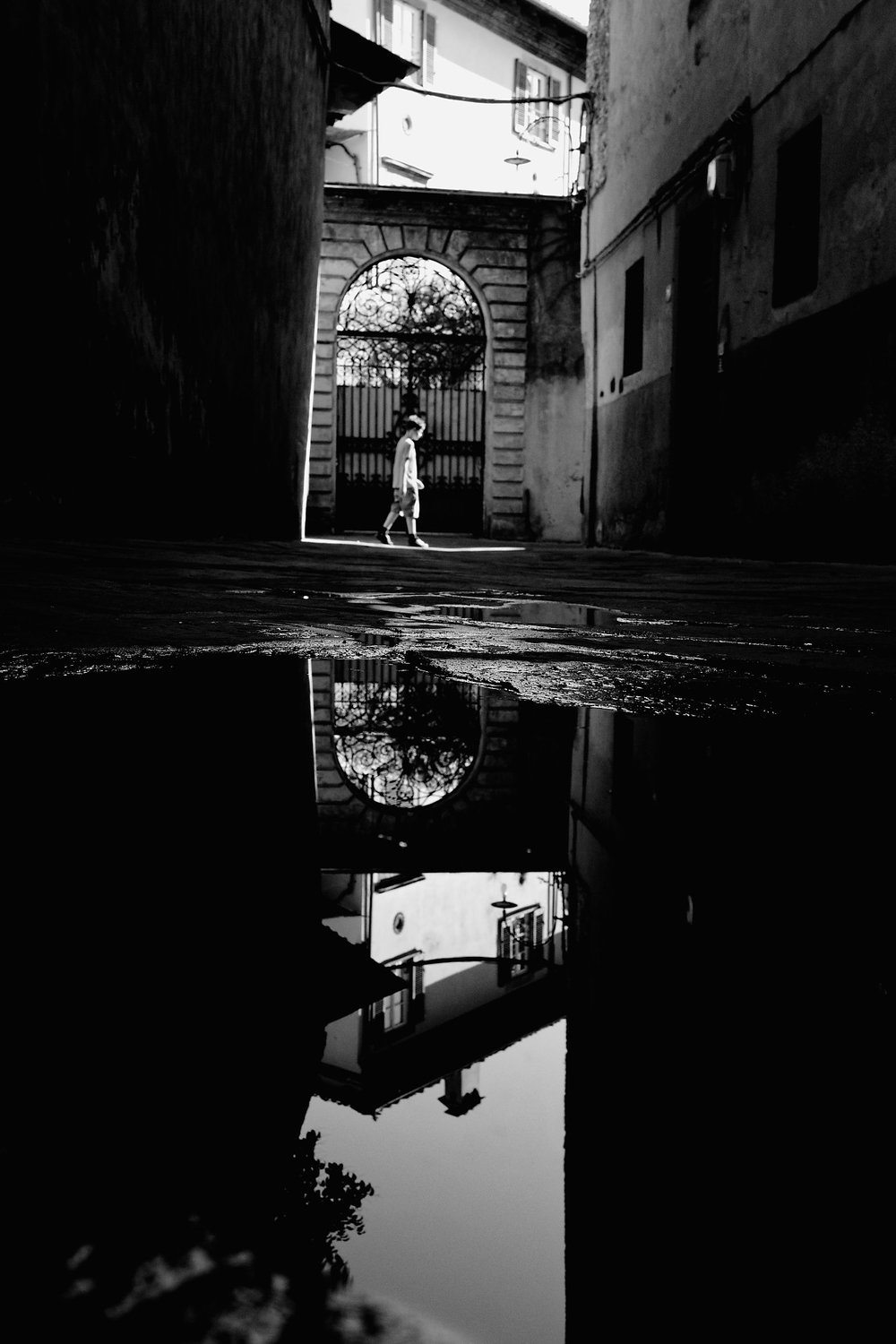 Archway in a puddle — Reflections