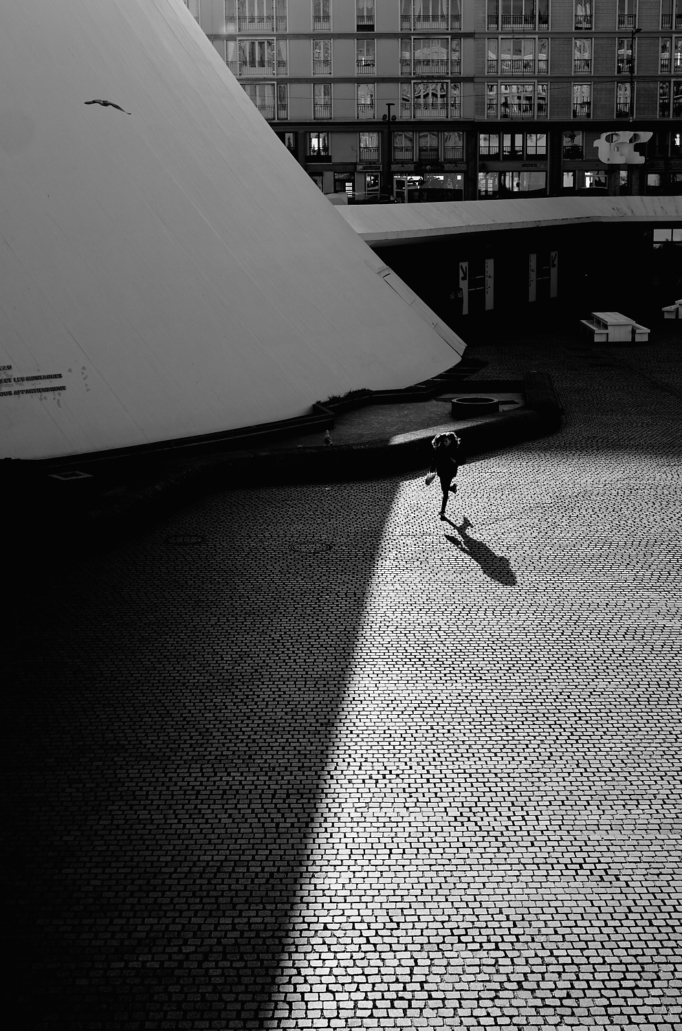 Shadow on cobblestones