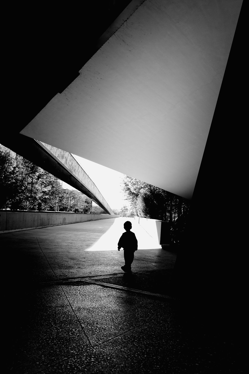 Child walking into the light — Light as Structure